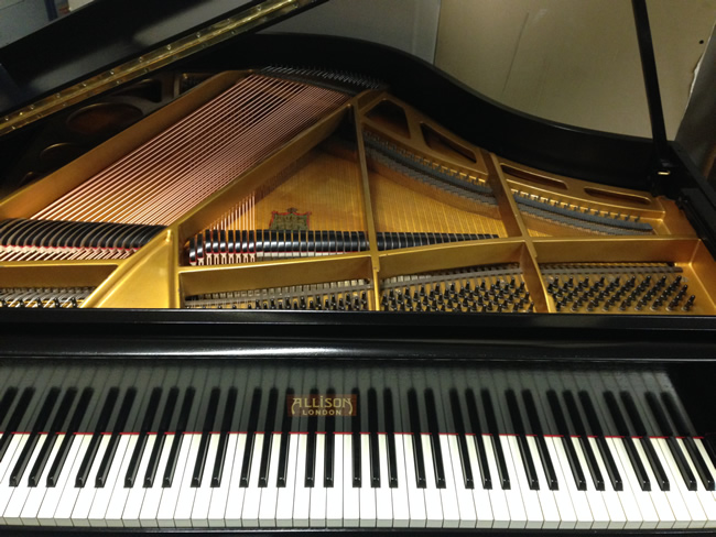 Allison baby grand piano frame with new bass strings and dampers.