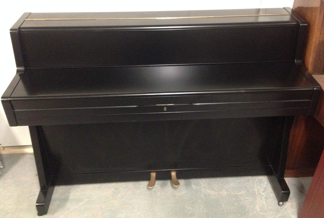 Allisonette mini piano in a black satin finish.