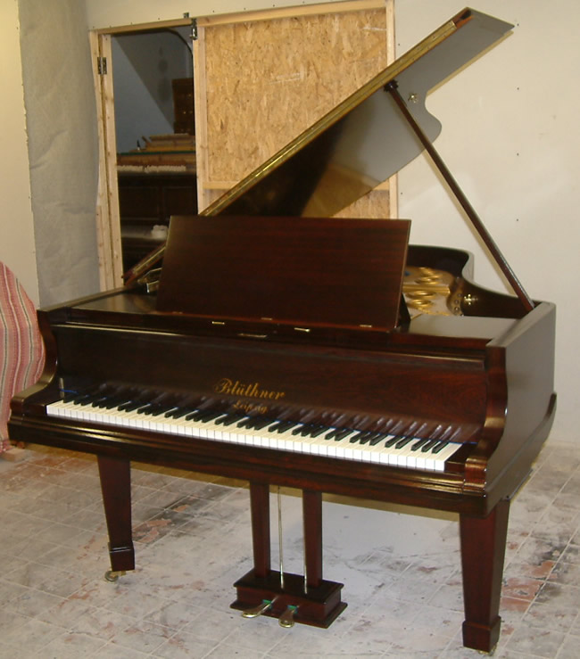 Bluthner Grand piano in a rosewood satin finish.