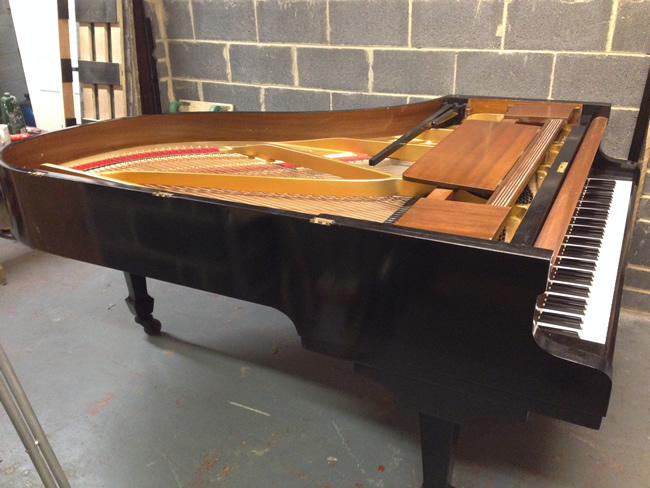 Danemann 6ft 8in Grand Piano sideview.