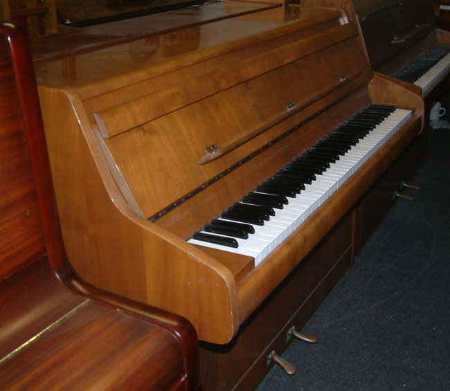 Bentley Walnut pianos