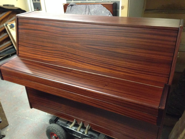 Mahogany modern upright.