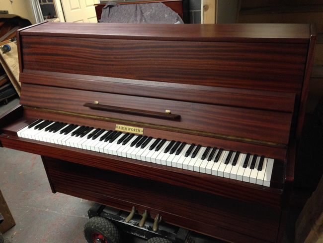 Rushworth upright piano.