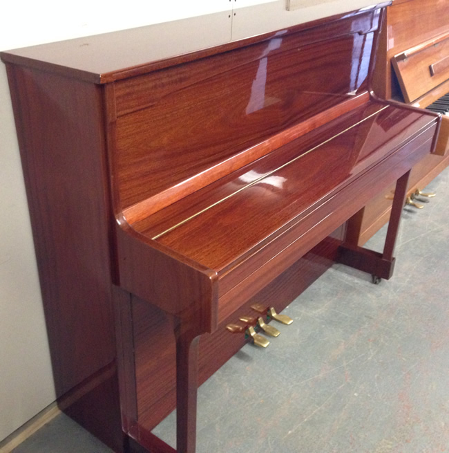 Streicher upright pianos.